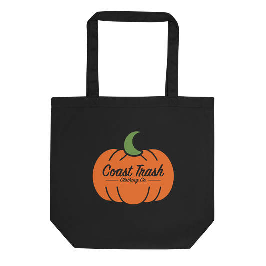 Front of the black Just One More House Eco Tote with orange Coast Trash pumpkin and green crescent. Matching artwork is printed on both sides.